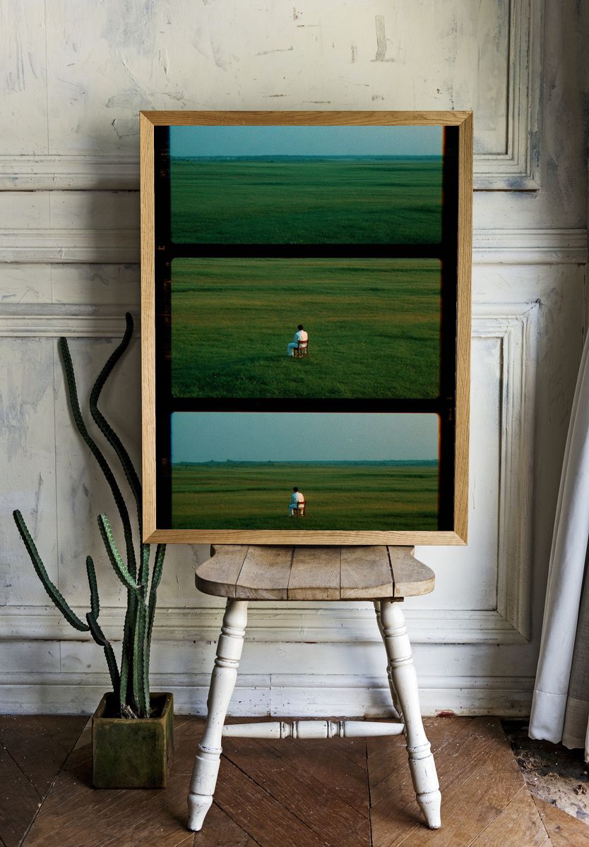 Solitary Figure in Meadow Photography Poster. — room view 1