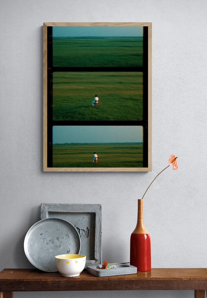 Solitary Figure in Meadow Photography Poster. — room view 3