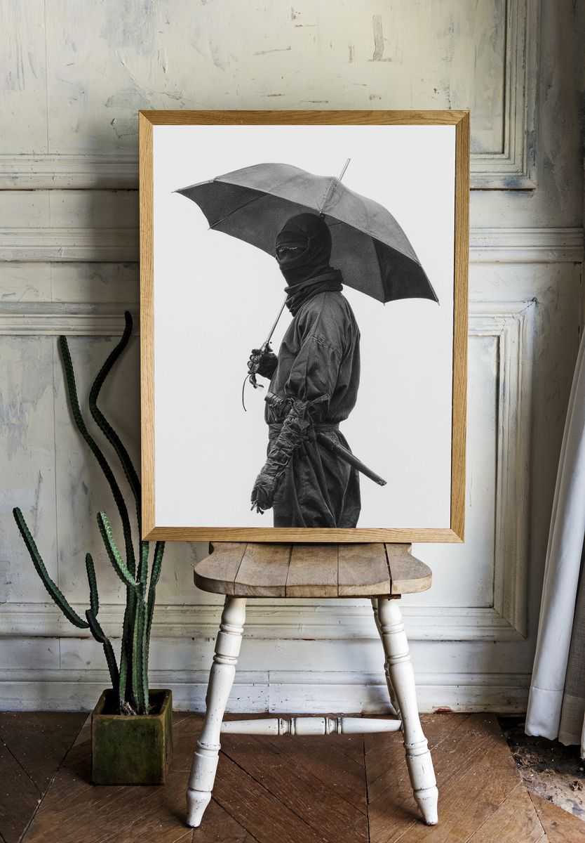 Masked Figure with Umbrella Photography Print. room preview