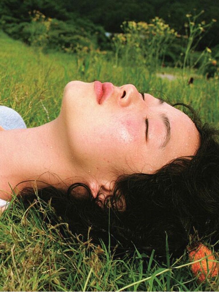Woman Resting in Grass Photography Poster. poster — photography art