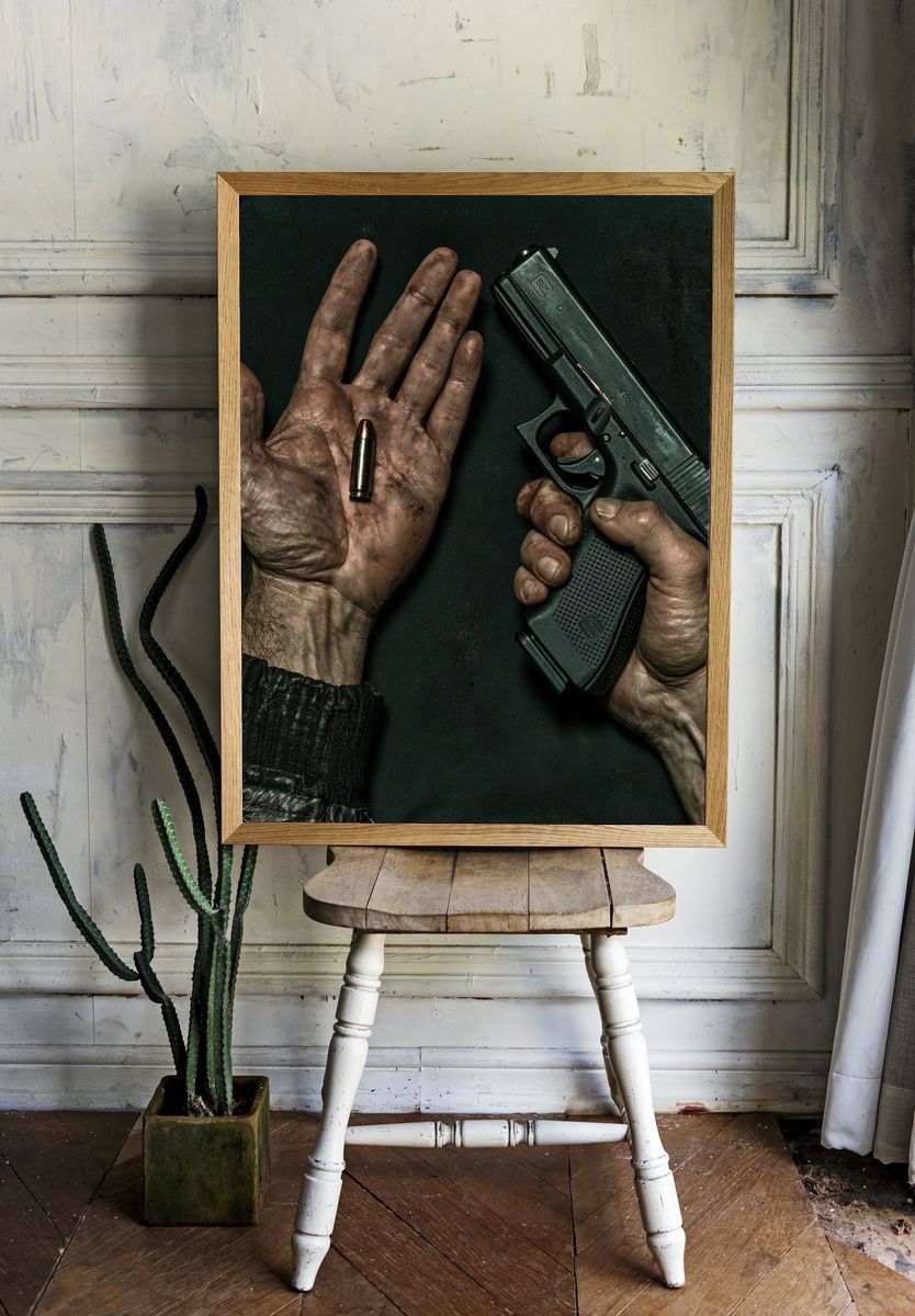 Bullet and Hand Photography Poster. — room view 1