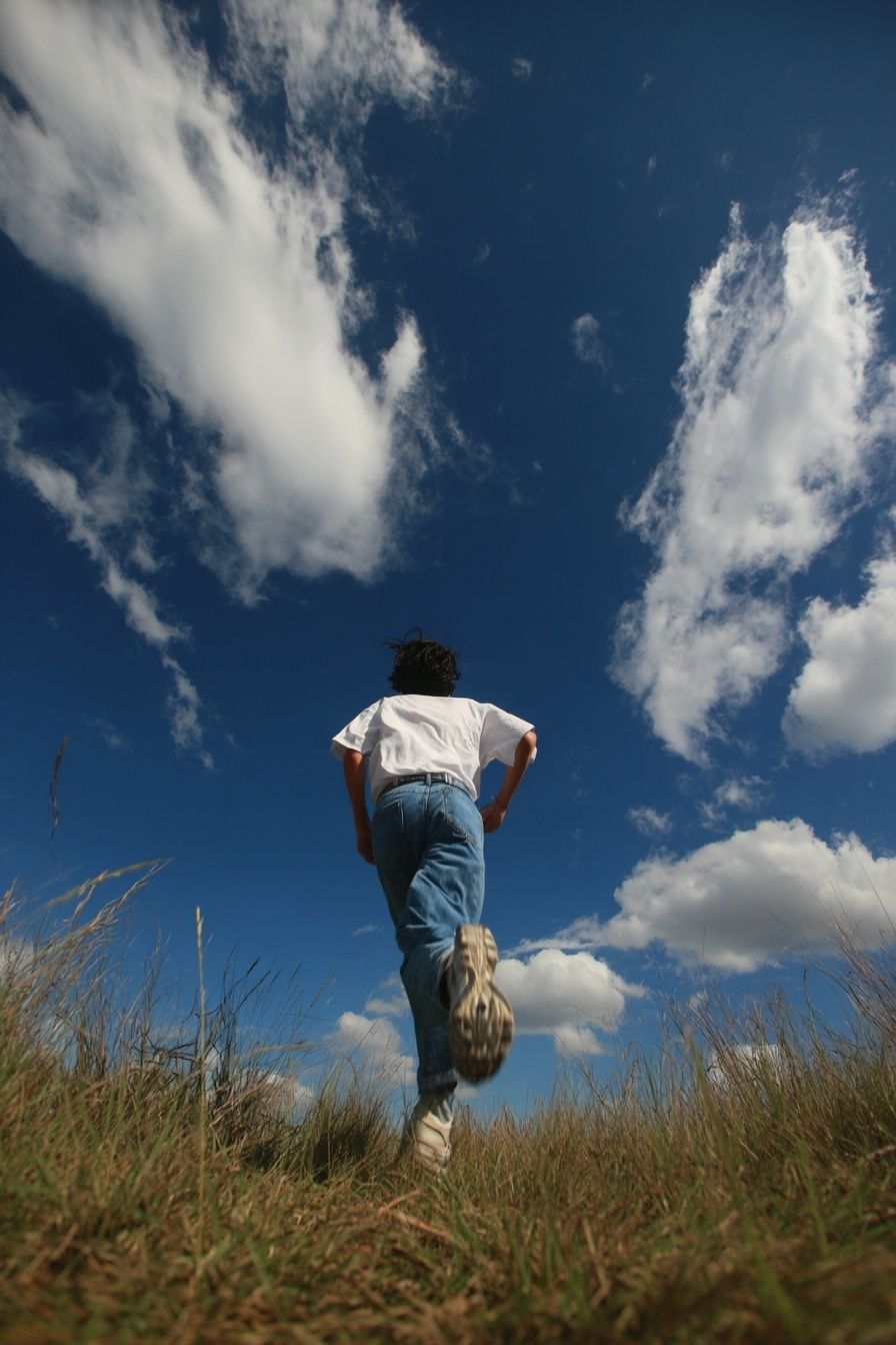 Runner Under Blue Sky Photography Poster. poster — photography art