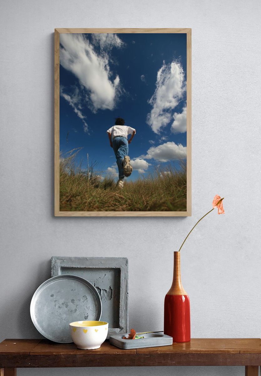 Runner Under Blue Sky Photography Poster. — room view 3