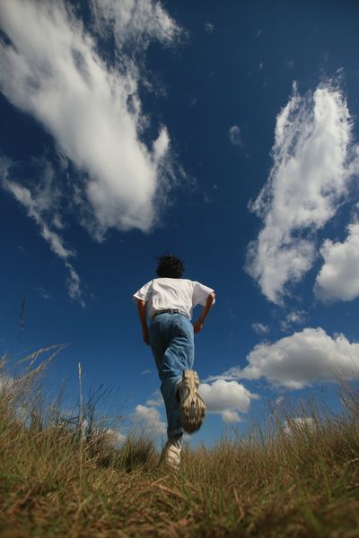 Runner Under Blue Sky Photography Poster.