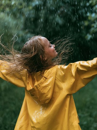 Child in Rain Photography Poster. poster