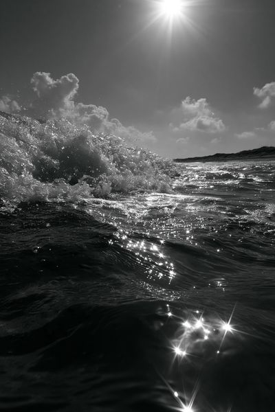 Sunlit Ocean Wave Photography Poster.