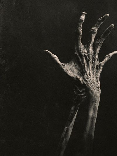 Eerie Hand in Darkness Photography Poster. poster