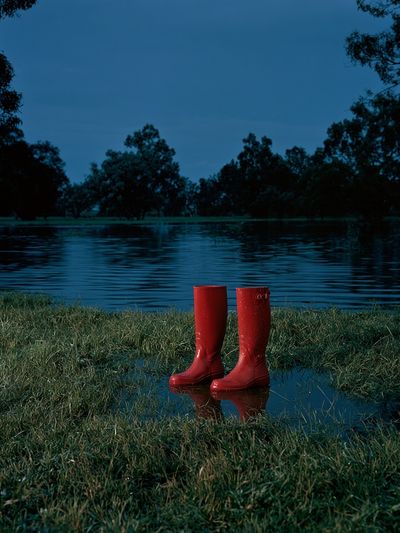 Red Rain Boots by the Lake Poster.