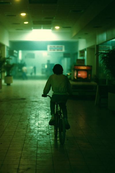 Cyclist in Neon Corridor Photography Poster. poster