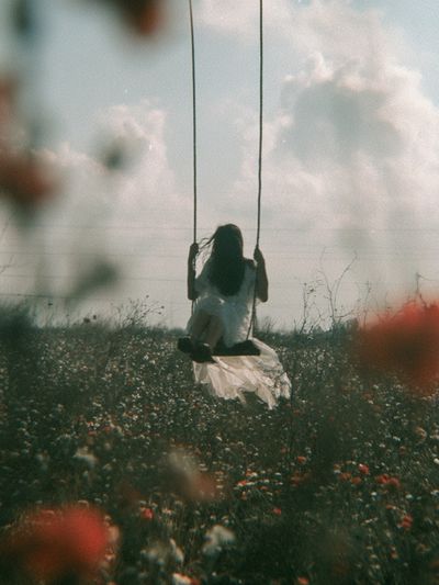 Girl on Swing Field Photography Poster. poster