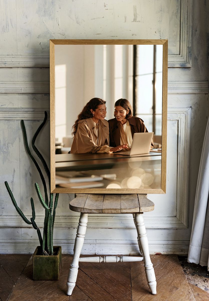 Sunlit Women at Laptop Photography Poster. room preview