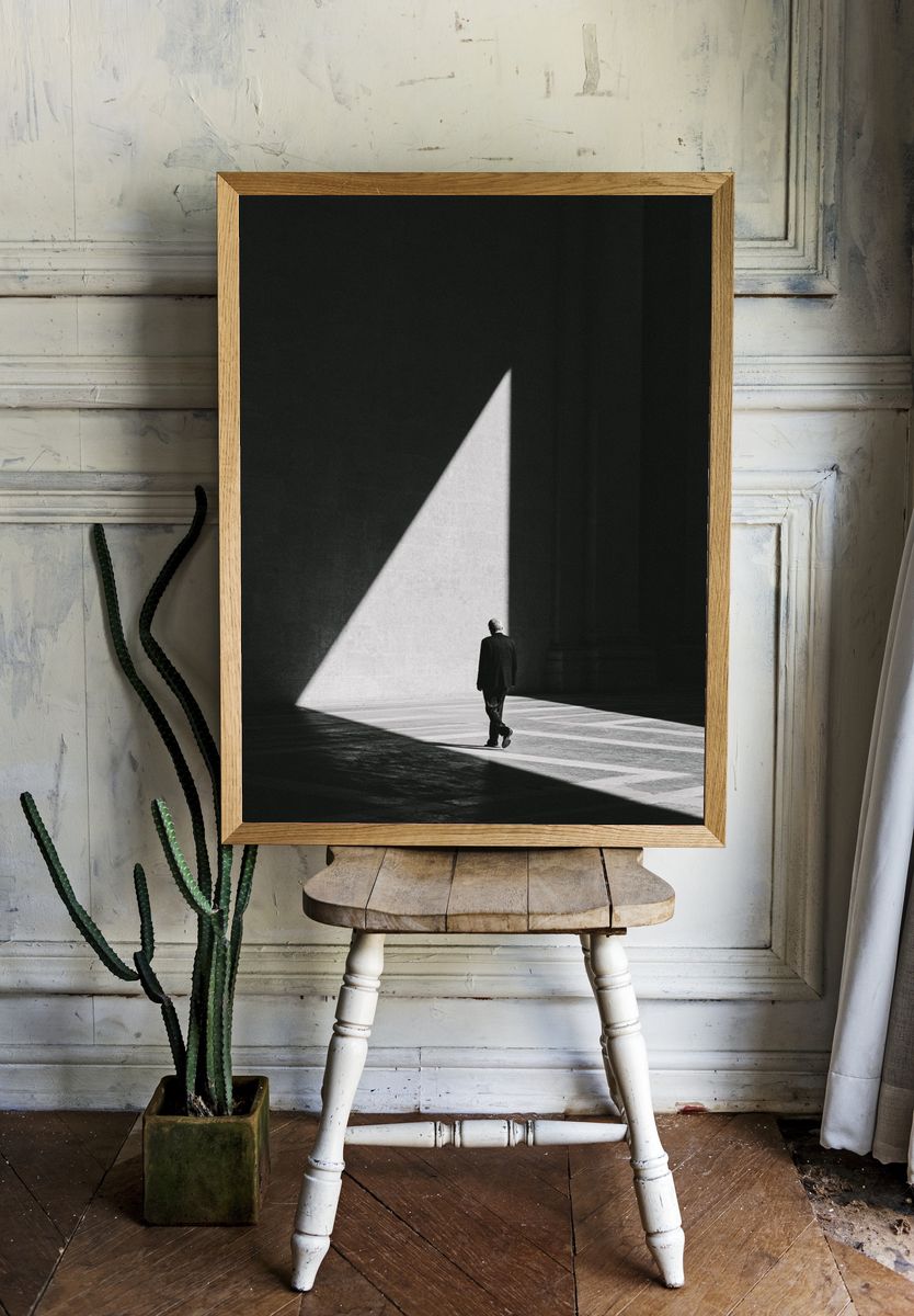 Solitary Figure in Light Photography Poster. — room view 1