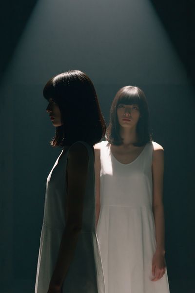 Twin Portrait in Spotlight Poster.