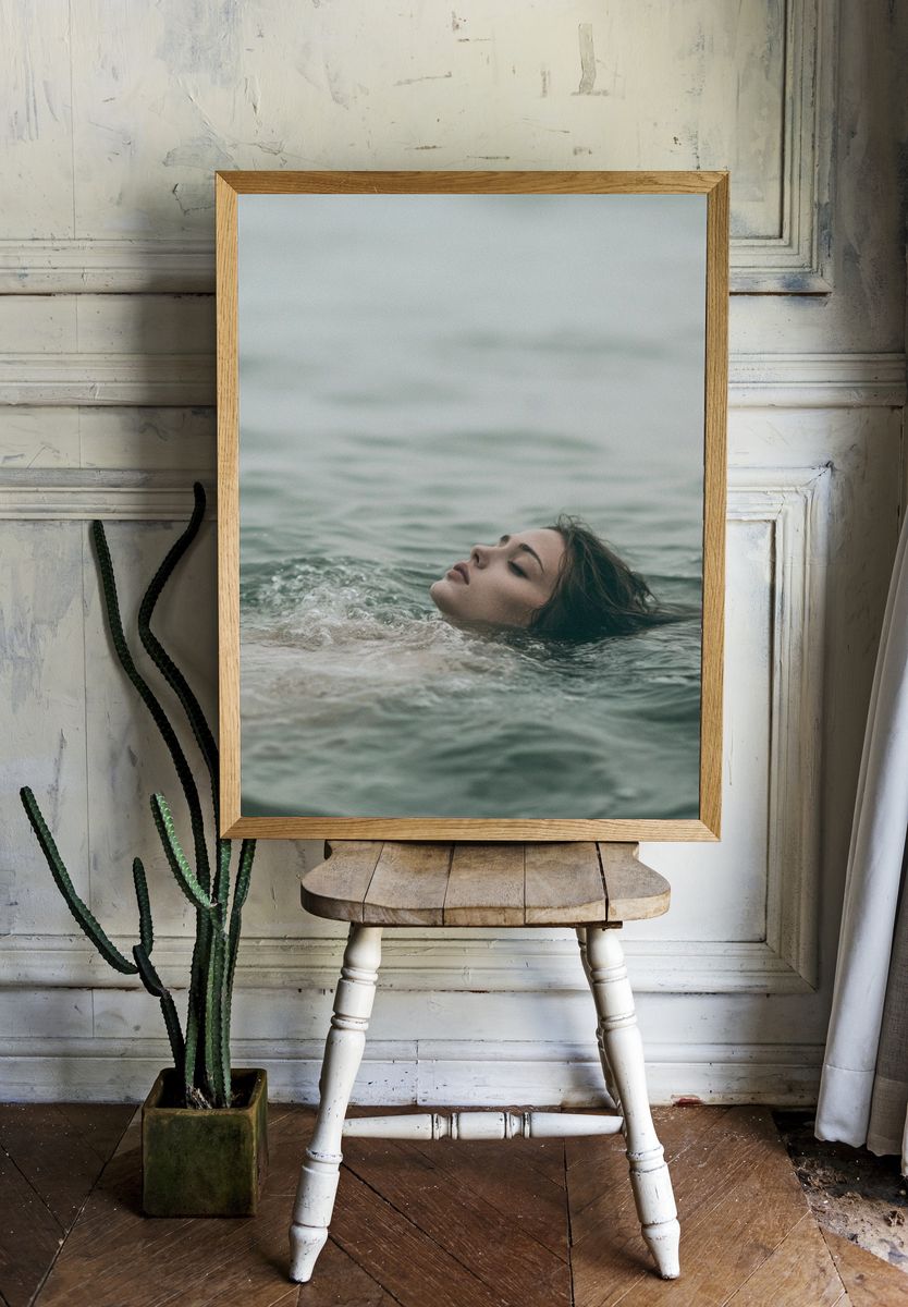 Floating Woman in Sea Photography Print. — room view 1