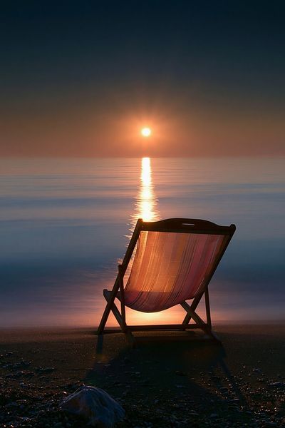 Sunset Beach Chair Photography Poster. poster