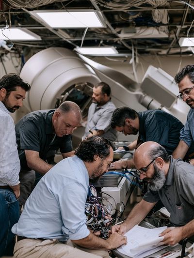 Engineers in Control Room Photography Poster. poster