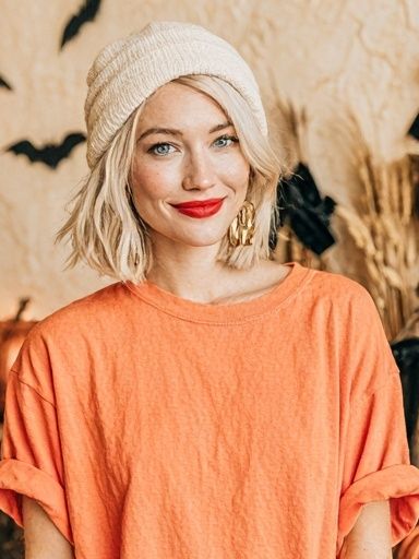 Blonde Portrait in Orange Top Poster. poster — photography art