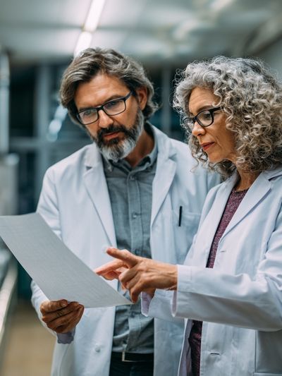 Scientists Reviewing Data Photography Poster.