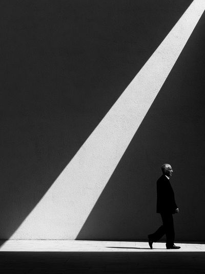 Solitary Figure in Light Poster.