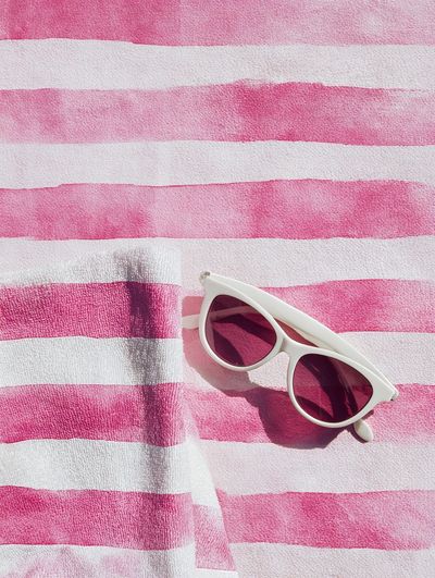 Pink Striped Beach Towel Print. poster