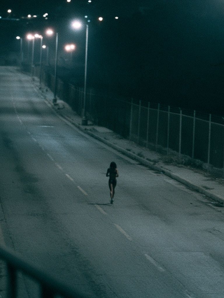 Night Runner Street Photography Poster. poster detail