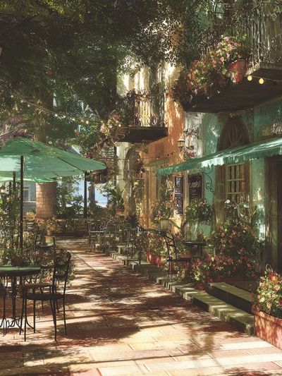 Sunlit Courtyard Café Photography Poster.
