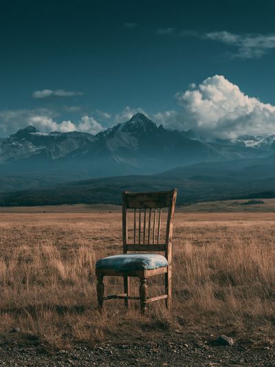 Solitary Chair in Mountain Meadow Print. poster