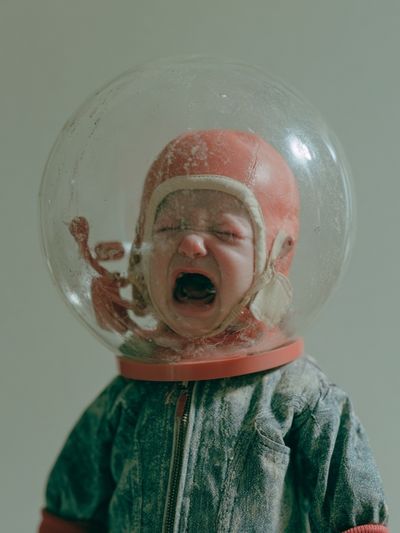 Yawning Baby Helmet Portrait Print.