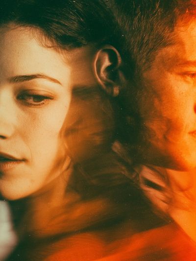Dual Portrait Orange Glow Poster.