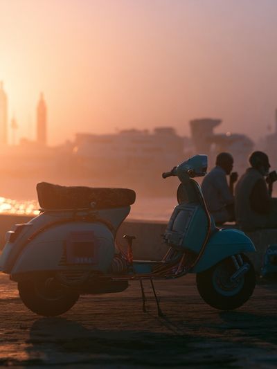 Sunset Vespa by the River Poster.