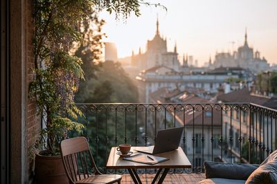 Sunlit Balcony City View Photography Poster.