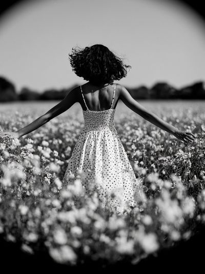 Girl in Flower Field Black-White Poster.