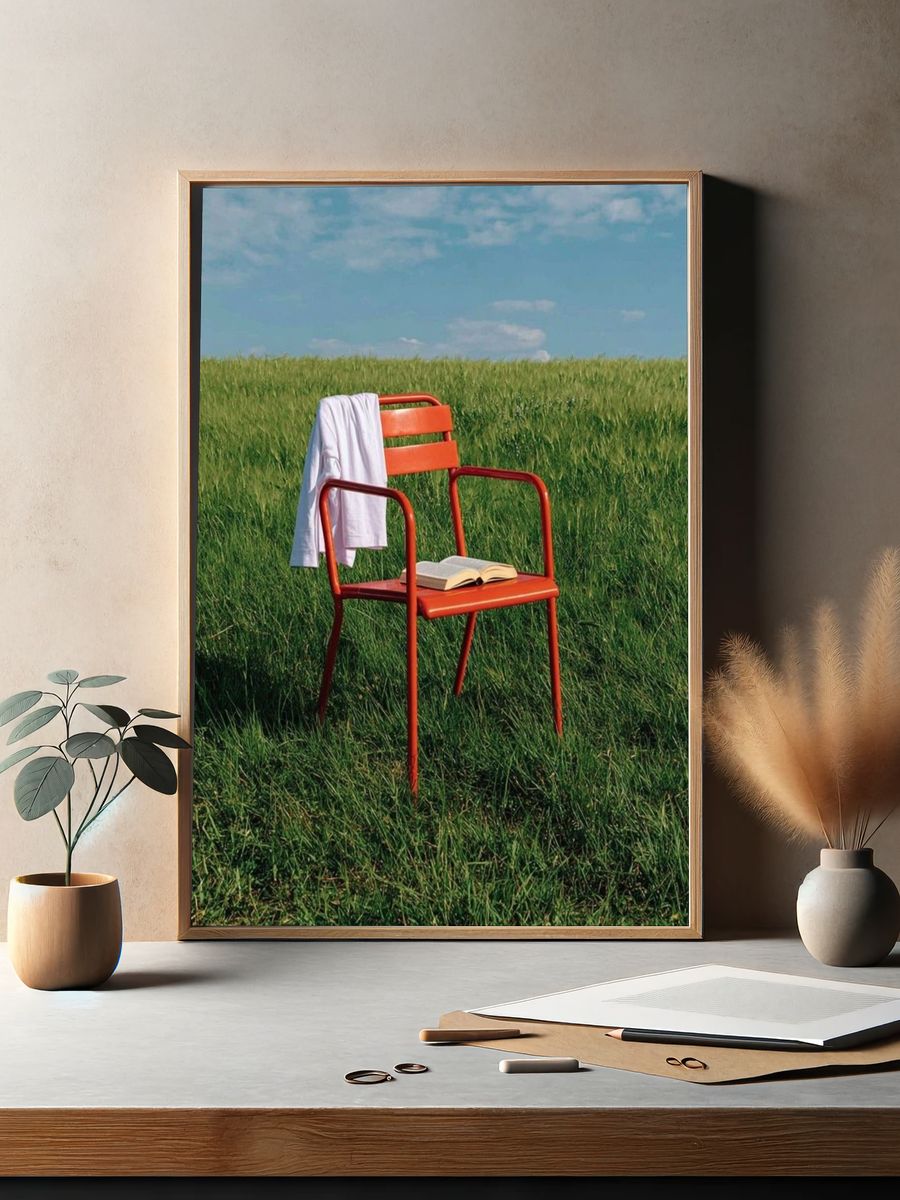 Red Chair in Meadow Photography Poster. — room view 2