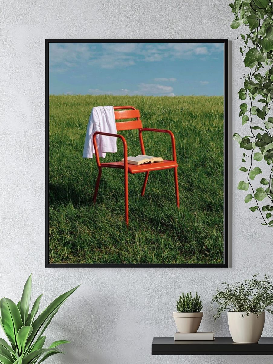 Red Chair in Meadow Photography Poster. — room view 4
