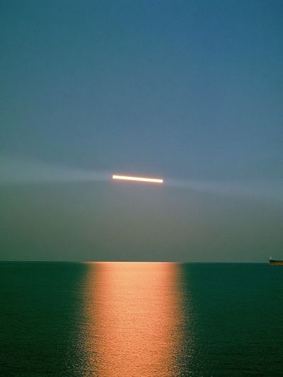 Moonlit Sea Horizon Photography Poster.