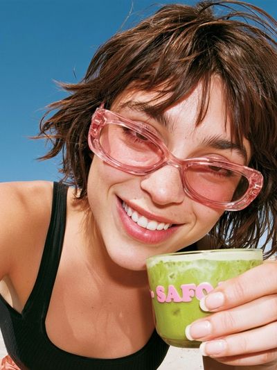 Smiling Woman with Matcha Portrait Poster.