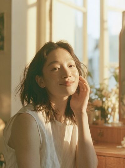 Sunlit Woman Portrait Photography Poster.