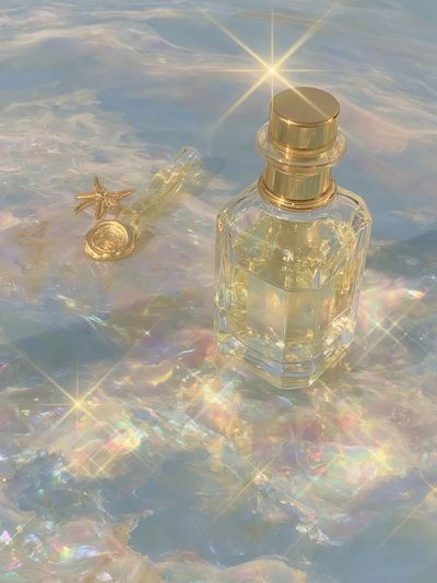Golden Perfume Bottle Aesthetic Poster. poster