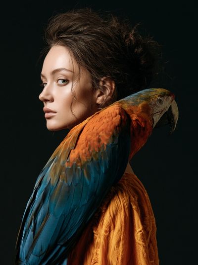 Woman with Parrot Portrait Print.
