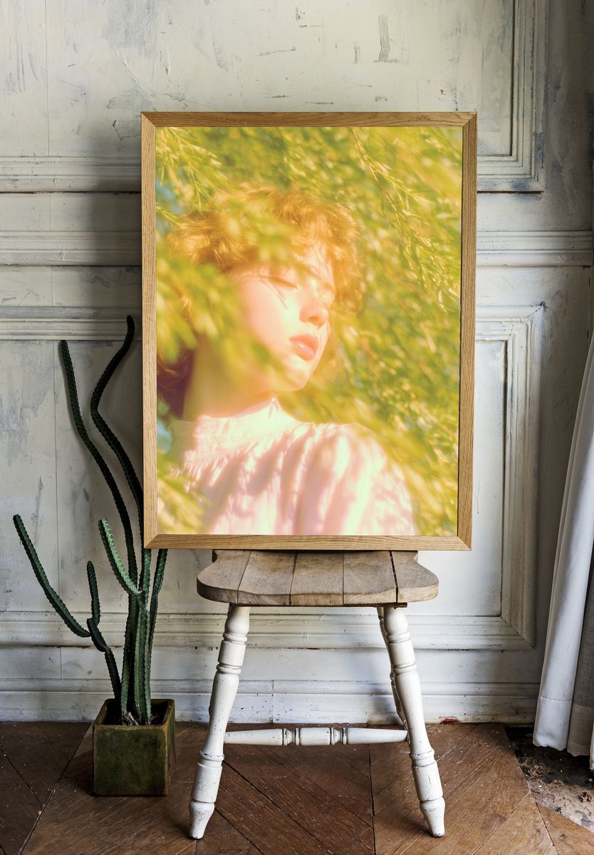 Sunlit Portrait in Green Foliage Poster. — room view 1
