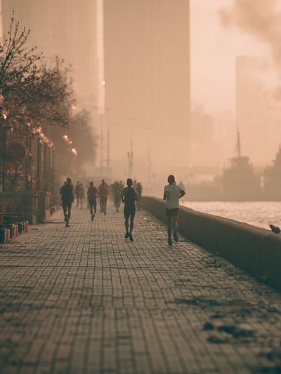 Sunset Riverside Runners Photography Poster. poster