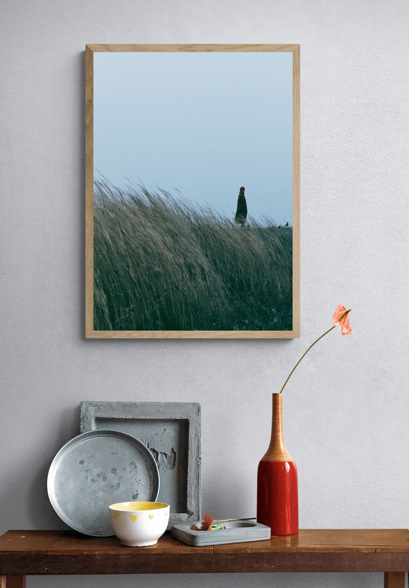Solitary Figure in Dunes Photography Poster. — room view 3