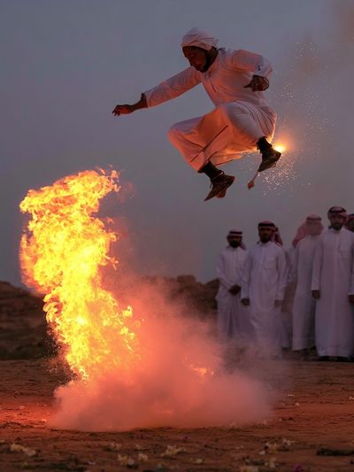 Fire Dance Jump Photography Print.