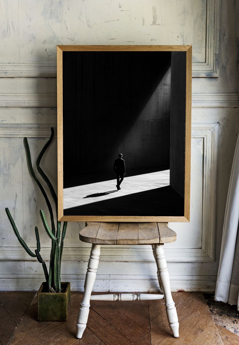 Solitary Figure in Light Photography Poster. — room view 1