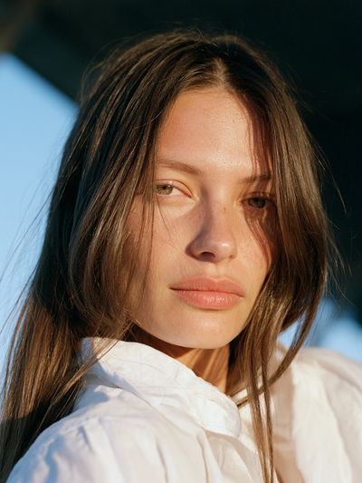 Sunlit Woman Portrait Print. poster