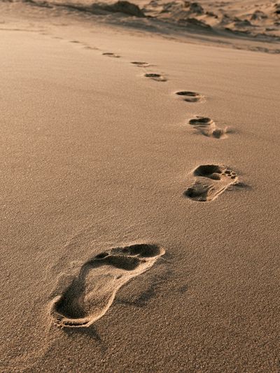 Footprints on Sand Photography Poster.