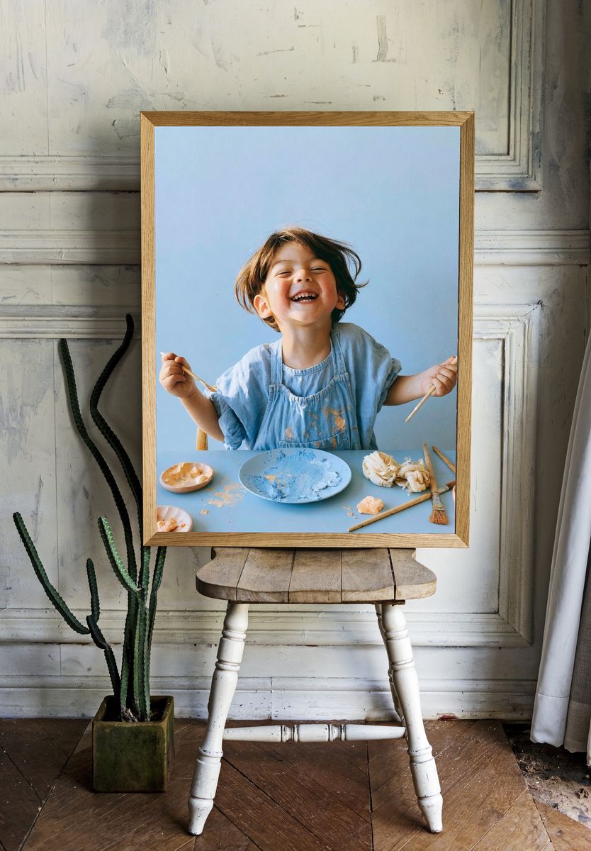 Joyful Child Painting Portrait Poster. room preview