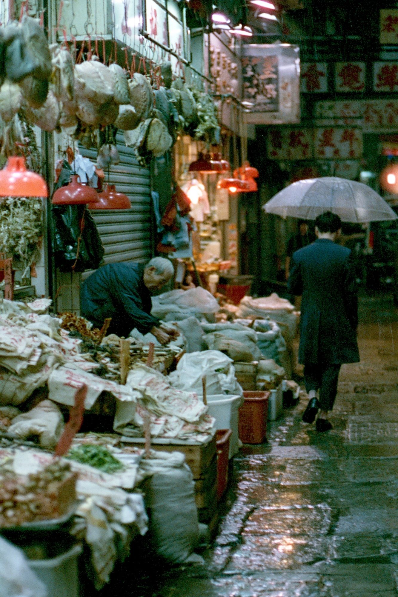 Rainy Market Alley Photography Poster. poster detail