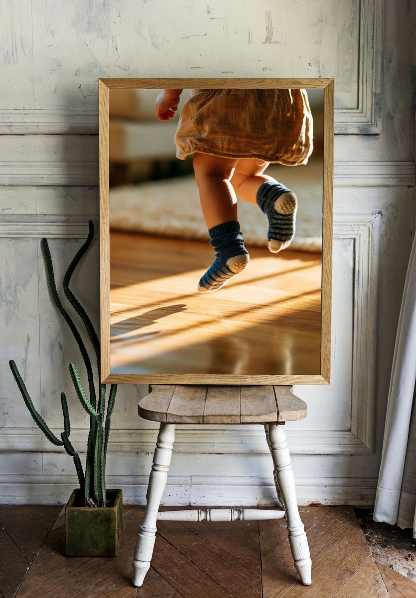 Toddler Jumping in Sunlight Photography Poster. room preview