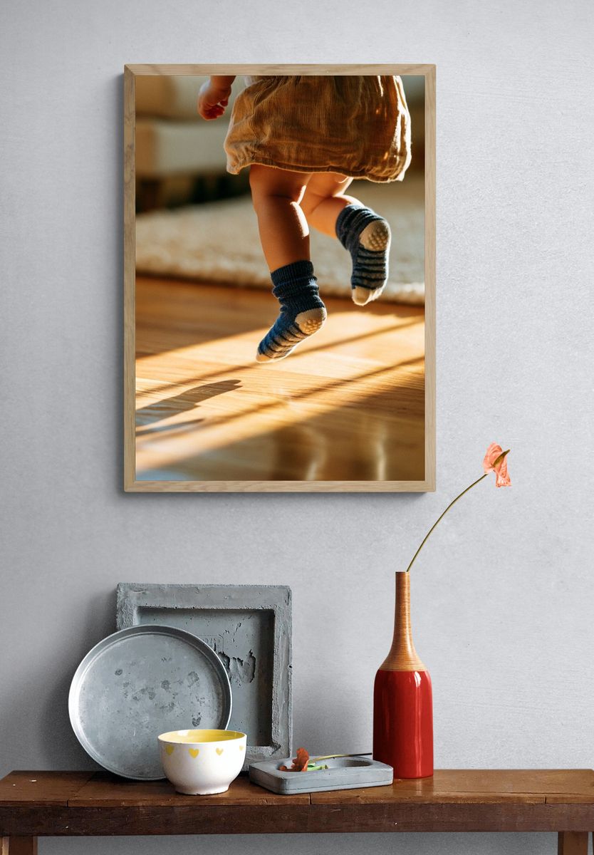 Toddler Jumping in Sunlight Photography Poster. — room view 3